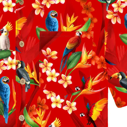 Dettaglio: fantasia all-over di pappagalli e fiori su tessuto rosso