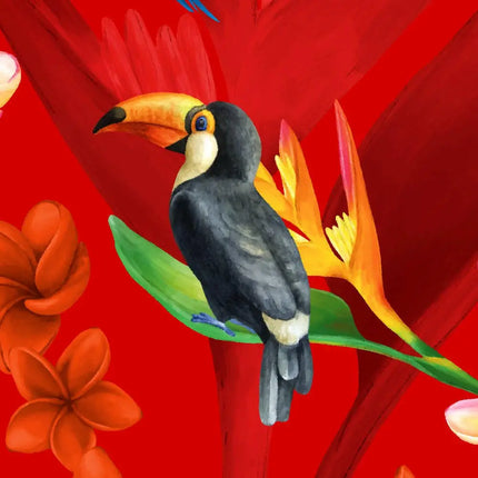 Dettaglio: grande becco di tucano e pappagallo su tessuto rosso con fiori gialli